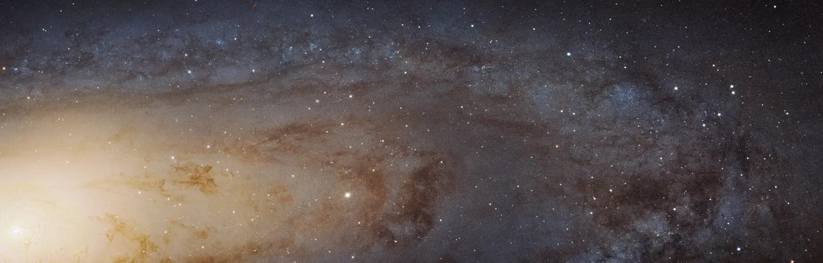 Reference image of the Andromeda Galaxy (M31) — a wide Hubble PHAT panoramic mosaic showing the extended disk and bright core