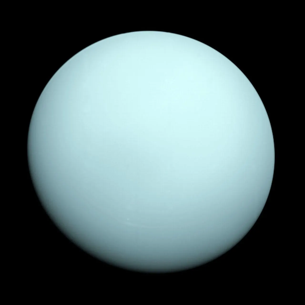 Reference image of Uranus from Voyager 2, showing the smooth pale-blue disk of the ice giant